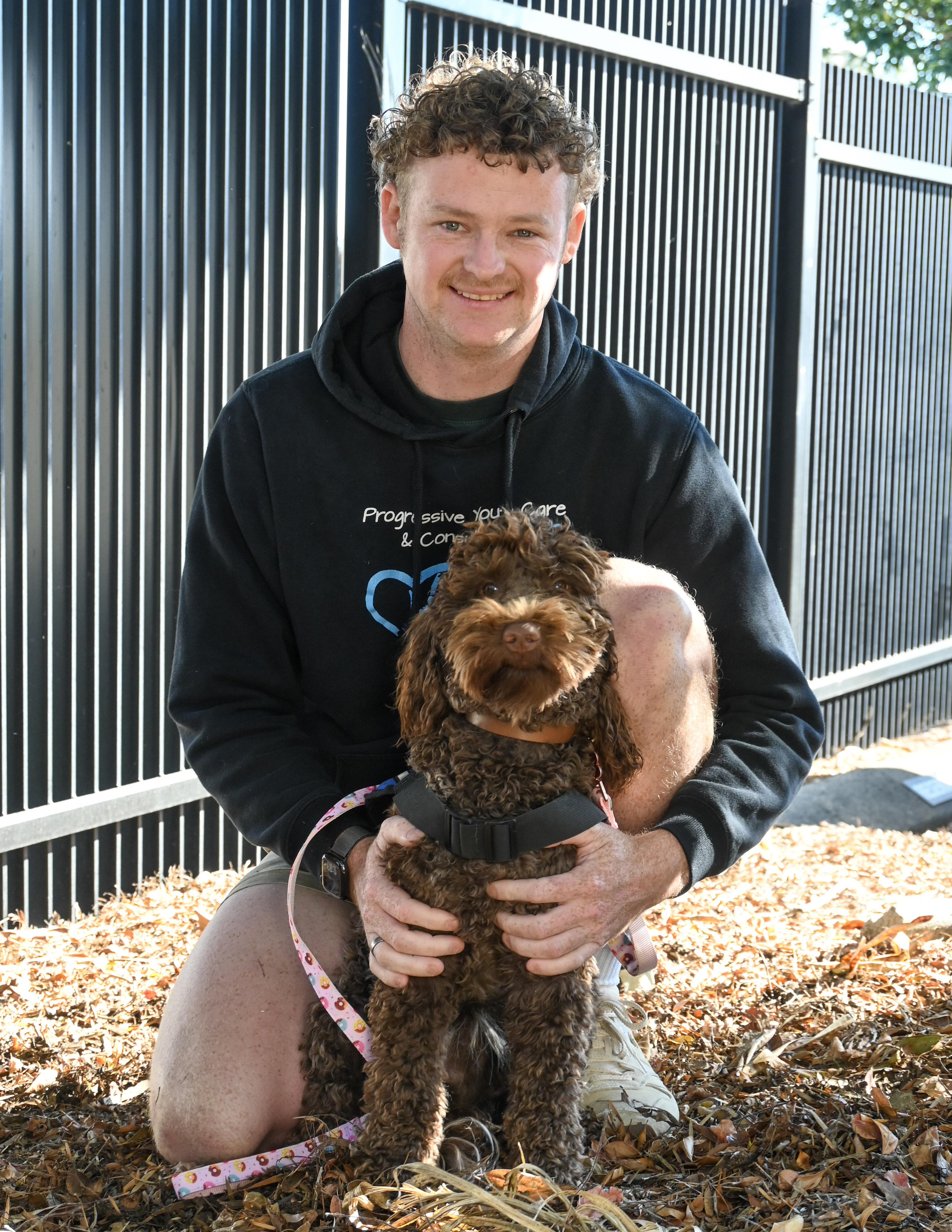PAWS therapy dog with a handler